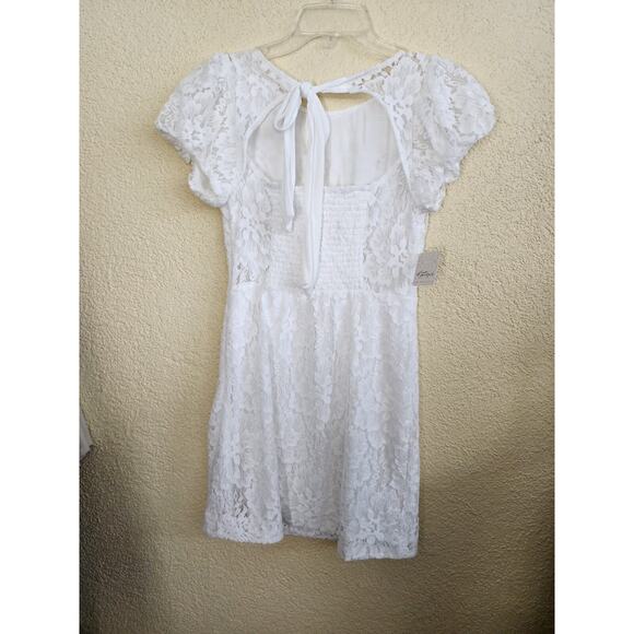 Free People Hailee Lace Mini Dress NWT Size S Ivory White Open Back Bow Boho - Picture 11 of 12
